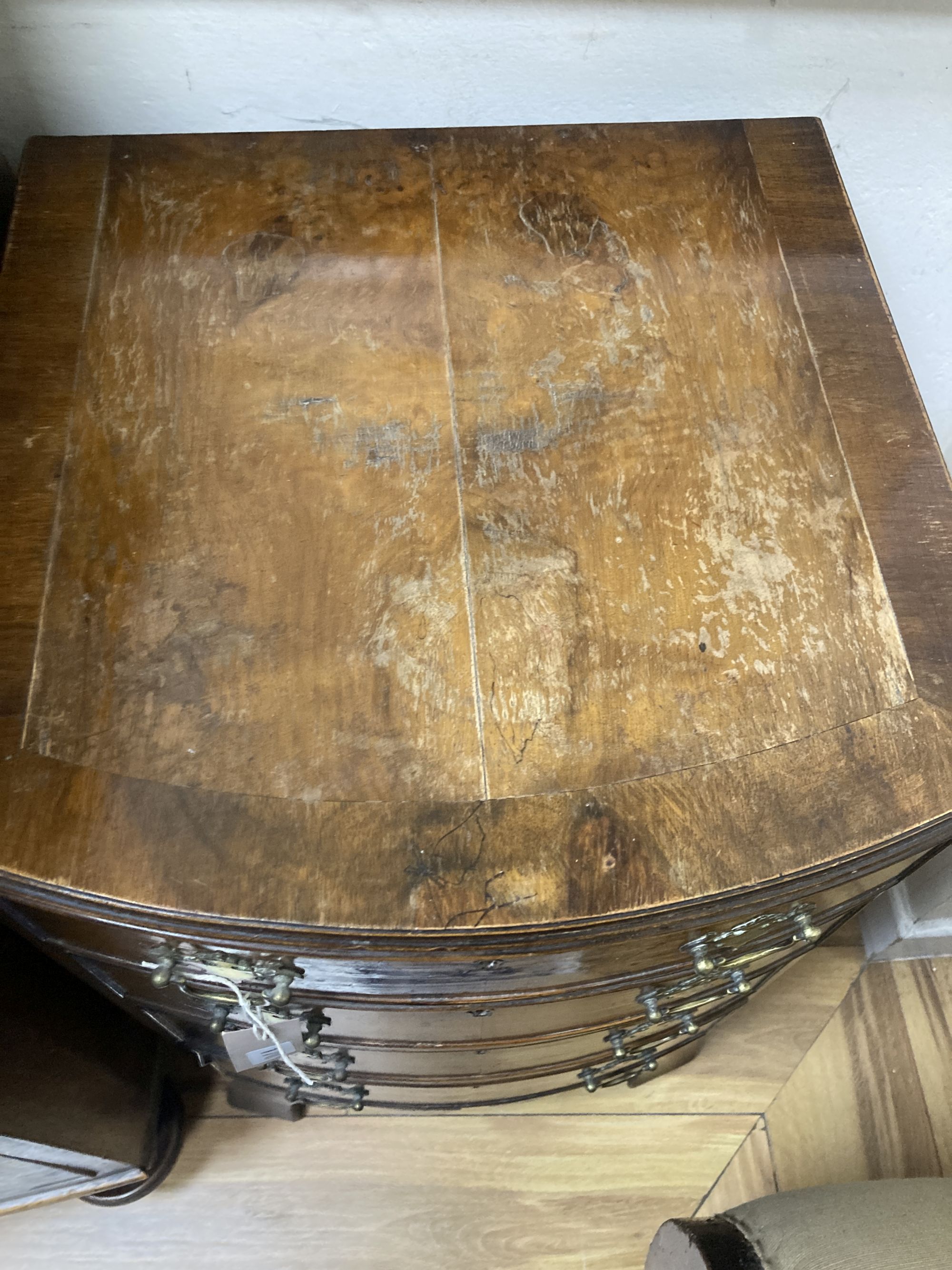 A small Queen Anne style walnut bow-fronted chest of drawers, width 44cm, depth 44cm, height 74cm